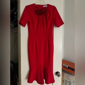 Sexy red Valentine’s Day dress with florettes and a flared hem. Size M